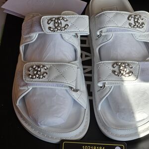 NEW ,CHANEL Quilted White Sandals with Silver Logo